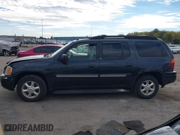 ✅ 2005 GMC Envoy SLT • VIN: 1GKET16S056193139 • Lot: 43435348. Wystawiony na IAAI z przebiegiem 182 616 mil. Bezpłatny archiwum sprzedaży aukcyjnych z USA i szczegółowy raport historii pojazdu na DreamBid. Zdjęcie 14.