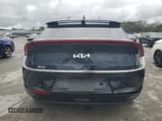 ✅ 2024 Kia EV6 Wind • VIN: KNDC3DLC5R5198575 • Lot: 90518965. Wystawiony na Copart z przebiegiem 9 450 mil. Bezpłatny archiwum sprzedaży aukcyjnych z USA i szczegółowy raport historii pojazdu na DreamBid. Zdjęcie 6.