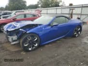 ✅ 2024 Lexus LC 500h • VIN: JTHMPAAY4RA110790 • Lot: 85269585. Wystawiony na Copart z przebiegiem 1 505 mil. Bezpłatny archiwum sprzedaży aukcyjnych z USA i szczegółowy raport historii pojazdu na DreamBid. Zdjęcie 1.