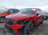 ✅ 2016 Mazda CX-5 Grand Touring • VIN: JM3KE4DY6G0782419 • Lot: 43813550. Wystawiony na IAAI z przebiegiem 122 952 mil. Bezpłatny archiwum sprzedaży aukcyjnych z USA i szczegółowy raport historii pojazdu na DreamBid. Zdjęcie 16.