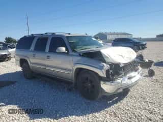 2004 Chevrolet Suburban LT z VIN 3GNEC16Z04G313261, wystawiony jako Copart lot #81499894 z przebiegiem Nie podano mil oraz Szkoda całkowita • Salvage title. Historia ofert i sprzedaży dostępna na DreamBid. Obrazek 4.
