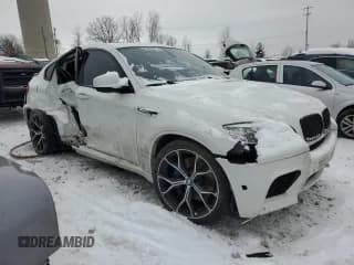 ✅ 2014 BMW X6 M • VIN: 5YMGZ0C51E0C40557 • Лот: 83258214. Опубликован ранее на Copart с пробегом Не указан. Бесплатный доступ к архиву аукционных продаж из США и подробный отчёт об истории автомобиля на DreamBid. Изображение 4.