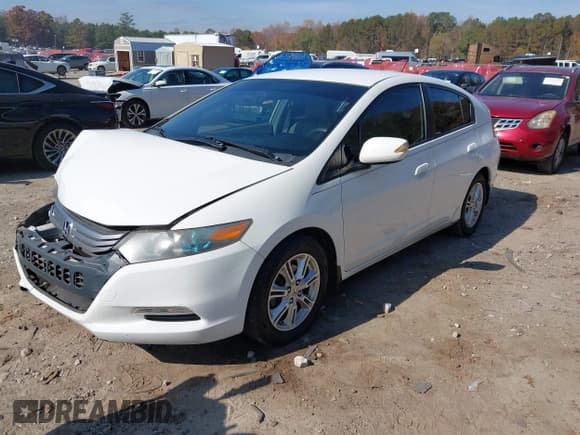 ✅ 2011 Honda Insight EX • VIN: JHMZE2H74BS004399 • Лот: 43653634. Опубликован ранее на IAAI с пробегом Не указан. Бесплатный доступ к архиву аукционных продаж из США и подробный отчёт об истории автомобиля на DreamBid. Изображение 17.