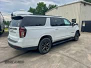 ✅ 2022 Chevrolet Suburban Z71 • VIN: 1GNSKDKD6NR150067 • Lot: 97274055. Listed on Copart with 73,416 mi. Free auction sales archive from the USA and detailed vehicle history report at DreamBid. Image 4.
