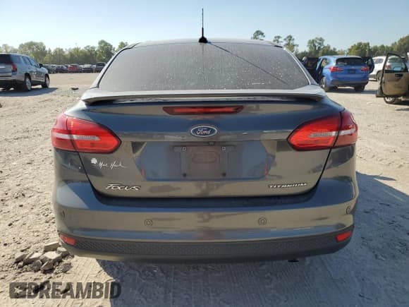 ✅ 2017 Ford Focus Titanium • VIN: 1FADP3J23HL211918 • Лот: 82481345. Опубликован ранее на Copart с пробегом 72 790 миль. Бесплатный доступ к архиву аукционных продаж из США и подробный отчёт об истории автомобиля на DreamBid. Изображение 6.