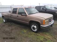 ✅ 1996 GMC Sierra 1500 • VIN: 1GTHC33J4TF010466 • Lot: 48392195. Wystawiony na Copart z przebiegiem 143 267 mil. Bezpłatny archiwum sprzedaży aukcyjnych z USA i szczegółowy raport historii pojazdu na DreamBid. Zdjęcie 4.
