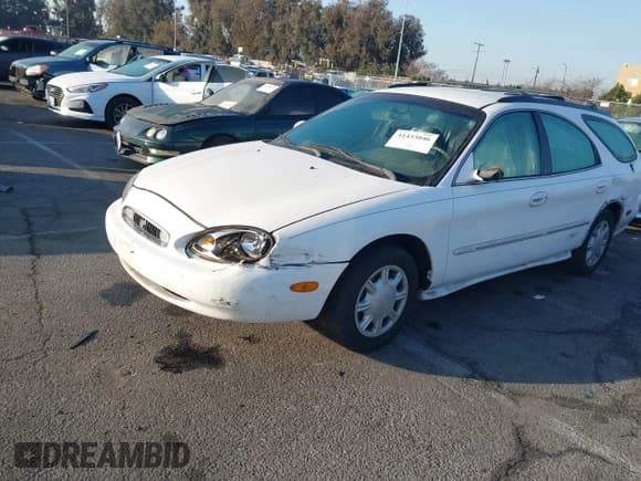 ✅ 1998 Mercury Sable LS • VIN: 1MEFM55U1WG608826 • Лот: 41433046. Опубликован ранее на IAAI с пробегом 138 291 миль. Бесплатный доступ к архиву аукционных продаж из США и подробный отчёт об истории автомобиля на DreamBid. Изображение 2.