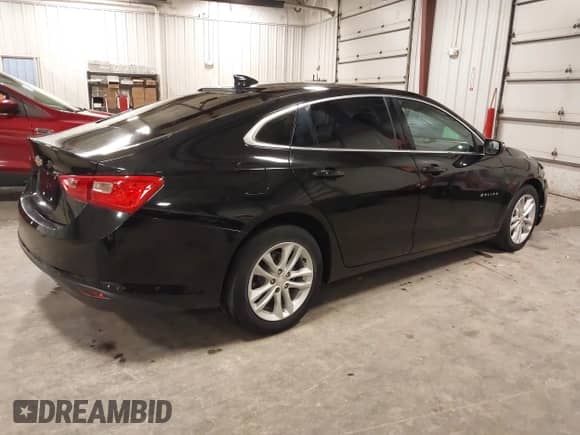 2018 Chevrolet Malibu LT z VIN 1G1ZD5ST4JF263938, wystawiony jako IAAI lot #43378625 z przebiegiem 90 540 mil mil oraz . Historia ofert i sprzedaży dostępna na DreamBid. Obrazek 4.