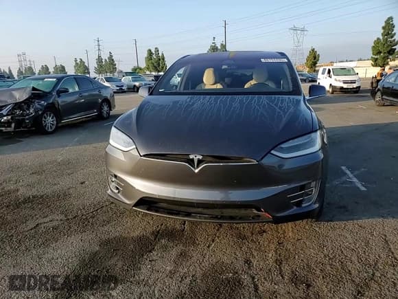 ✅ 2016 Tesla Model X 70D • VIN: 5YJXCBE27GF028515 • Lot: 86704495. Wystawiony na Copart z przebiegiem 71 792 mil. Bezpłatny archiwum sprzedaży aukcyjnych z USA i szczegółowy raport historii pojazdu na DreamBid. Zdjęcie 13.