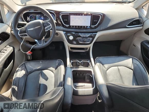 ✅ 2023 Chrysler Pacifica Hybrid Limited • VIN: 2C4RC1S74PR569691 • Лот: 69470075. Опубликован ранее на Copart с пробегом 29 191 миль. Бесплатный доступ к архиву аукционных продаж из США и подробный отчёт об истории автомобиля на DreamBid. Изображение 8.