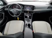 ✅ 2019 Volkswagen Jetta S • VIN: 3VWC57BU3KM083699 • Lot: 43065145. Wystawiony na Copart z przebiegiem 123 738 mil. Bezpłatny archiwum sprzedaży aukcyjnych z USA i szczegółowy raport historii pojazdu na DreamBid. Zdjęcie 8.