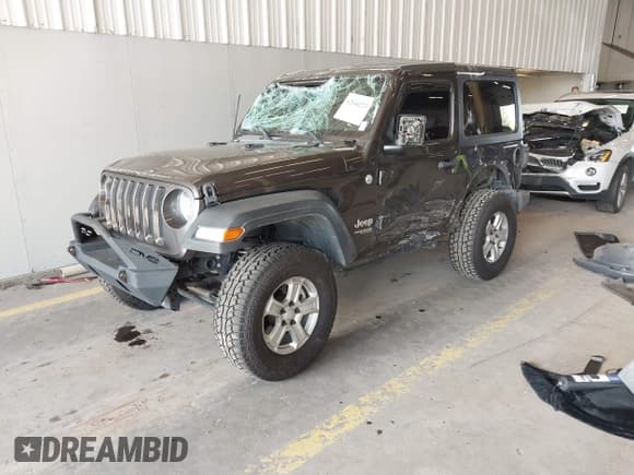 ✅ 2020 Jeep Wrangler Willys • VIN: 1C4GJXAG4LW237057 • Lot: 42044223. Listed on IAAI with 54,802 mi. Free auction sales archive from the USA and detailed vehicle history report at DreamBid. Image 2.