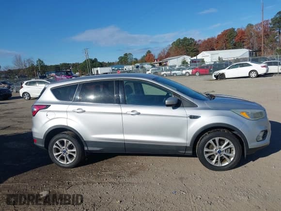 ✅ 2017 Ford Escape SE • VIN: 1FMCU9GD1HUD56858 • Lot: 43696316. Listed on IAAI with 130,024 mi. Free auction sales archive from the USA and detailed vehicle history report at DreamBid. Image 13.