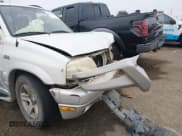 ✅ 2003 Suzuki Grand Vitara • VIN: JS3TE62VX34100454 • Lot: 43839370. Listed on IAAI with 198,777 mi. Free auction sales archive from the USA and detailed vehicle history report at DreamBid. Image 13.