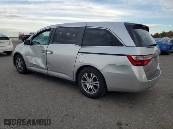 ✅ 2011 Honda Odyssey EX-L • VIN: 5FNRL5H62BB009954 • Lot: 87390455. Listed on Copart with 162,357 mi. Free auction sales archive from the USA and detailed vehicle history report at DreamBid. Image 2.