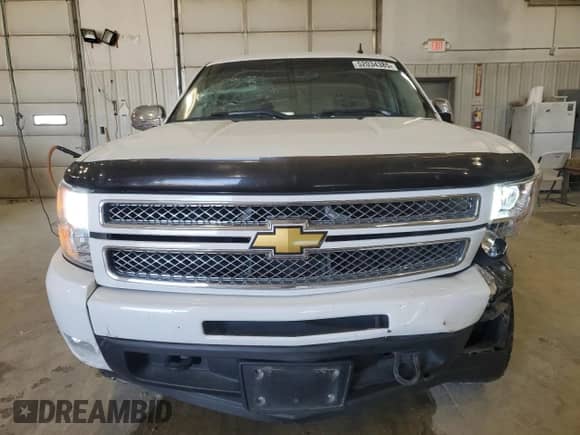 2012 Chevrolet Silverado 1500 LTZ z VIN 1GCRKTE7XCZ253075, wystawiony jako Copart lot #52034385 z przebiegiem 123 470 mil mil oraz Szkoda całkowita • Salvage title. Historia ofert i sprzedaży dostępna na DreamBid. Obrazek 5.