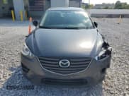 ✅ 2016 Mazda CX-5 Sport • VIN: JM3KE2BE3G0608529 • Lot: 81275925. Wystawiony na Copart z przebiegiem 141 282 mil. Bezpłatny archiwum sprzedaży aukcyjnych z USA i szczegółowy raport historii pojazdu na DreamBid. Zdjęcie 5.