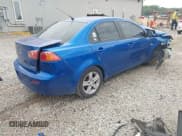 ✅ 2009 Mitsubishi Lancer ES • VIN: JA3AU26U29U029549 • Lot: 42454423. Listed on IAAI with 146,949 mi. Free auction sales archive from the USA and detailed vehicle history report at DreamBid. Image 4.