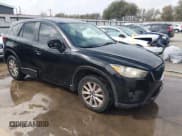 ✅ 2015 Mazda CX-5 Touring • VIN: JM3KE2CY0F0503003 • Lot: 43581255. Wystawiony na IAAI z przebiegiem 296 971 mil. Bezpłatny archiwum sprzedaży aukcyjnych z USA i szczegółowy raport historii pojazdu na DreamBid. Zdjęcie 1.