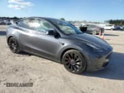 ✅ 2022 Tesla Model Y Performance • VIN: 7SAYGDEFXNF517160 • Lot: 92797085. Listed on Copart with 26,777 mi. Free auction sales archive from the USA and detailed vehicle history report at DreamBid. Image 4.