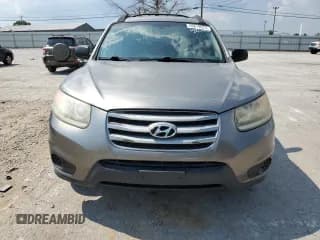 ✅ 2012 Hyundai Santa Fe GLS • VIN: 5XYZGDAB9CG114426 • Lot: 69819974. Listed on Copart with 233,854 mi. Free auction sales archive from the USA and detailed vehicle history report at DreamBid. Image 5.