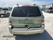 ✅ 2010 Mercury Mariner • VIN: 4M2CN8BG8AKJ11564 • Lot: 64171555. Listed on Copart with 180,034 mi. Free auction sales archive from the USA and detailed vehicle history report at DreamBid. Image 6.