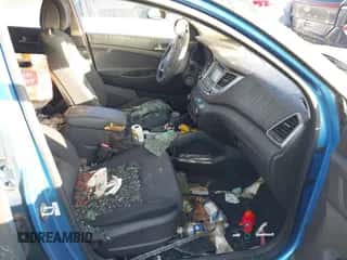 2017 Hyundai Tucson SE Plus z VIN KM8J33A40HU393075, wystawiony jako IAAI lot #43371895 z przebiegiem Nie podano mil oraz . Historia ofert i sprzedaży dostępna na DreamBid. Obrazek 5.