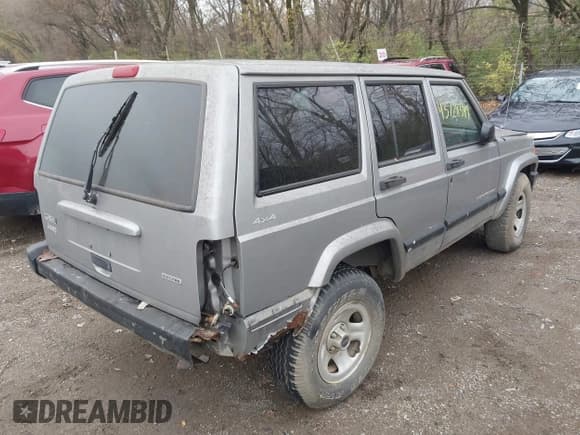 ✅ 2001 Jeep Cherokee Sport • VIN: 1J4FF48S31L596740 • Lot: 43728349. Listed on IAAI with 167,630 mi. Free auction sales archive from the USA and detailed vehicle history report at DreamBid. Image 4.