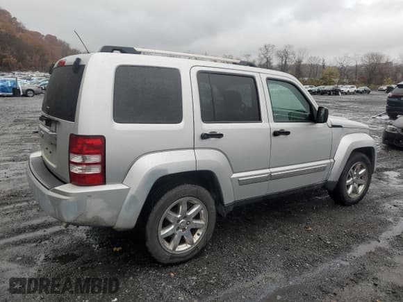 ✅ 2010 Jeep Liberty Limited • VIN: 1J4PN5GKXAW137055 • Lot: 92523115. Listed on Copart with 132,052 mi. Free auction sales archive from the USA and detailed vehicle history report at DreamBid. Image 3.