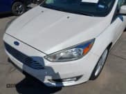 ✅ 2018 Ford Focus Titanium • VIN: 1FADP3N26JL271708 • Lot: 43531238. Listed on IAAI with 154,503 mi. Free auction sales archive from the USA and detailed vehicle history report at DreamBid. Image 19.
