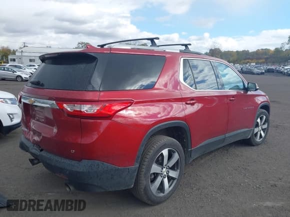 ✅ 2018 Chevrolet Traverse LT • VIN: 1GNEVHKW0JJ165203 • Lot: 43509948. Listed on IAAI with 89,827 mi. Free auction sales archive from the USA and detailed vehicle history report at DreamBid. Image 4.