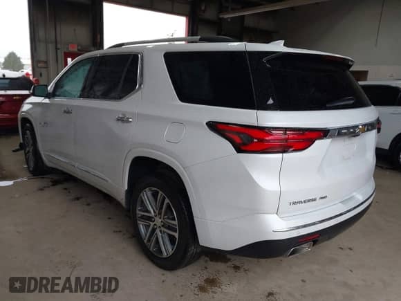 2022 Chevrolet Traverse High Country z VIN 1GNEVNKW6NJ181569, wystawiony jako IAAI lot #43291682 z przebiegiem 25 120 mil mil oraz . Historia ofert i sprzedaży dostępna na DreamBid. Obrazek 3.