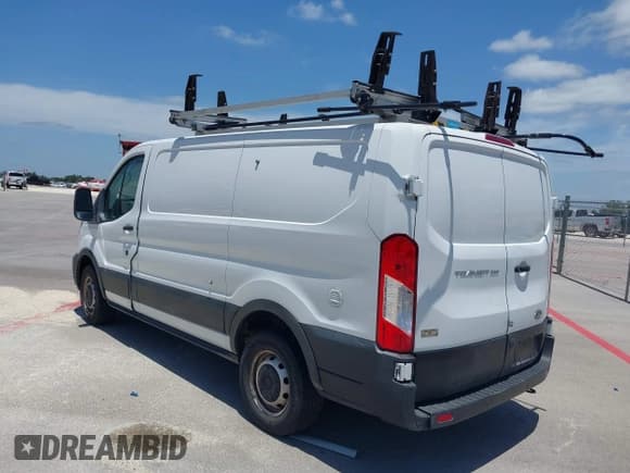 ✅ 2020 Ford Transit Cargo • VIN: 1FTBR1Y84LKA19741 • Lot: 42350802. Listed on IAAI with 90,186 mi. Free auction sales archive from the USA and detailed vehicle history report at DreamBid. Image 3.