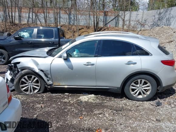 ✅ 2014 Infiniti QX70 • VIN: JN8CS1MW8EM410979 • Lot: 42053056. Listed on IAAI with Not provided. Free auction sales archive from the USA and detailed vehicle history report at DreamBid. Image 14.