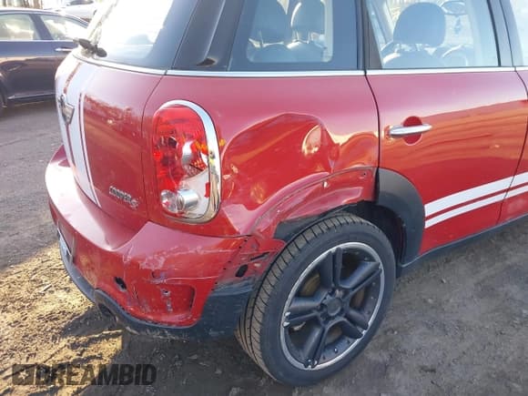 ✅ 2013 MINI Countryman S • VIN: WMWZC3C59DWP21215 • Lot: 43673391. Listed on IAAI with 117,225 mi. Free auction sales archive from the USA and detailed vehicle history report at DreamBid. Image 6.