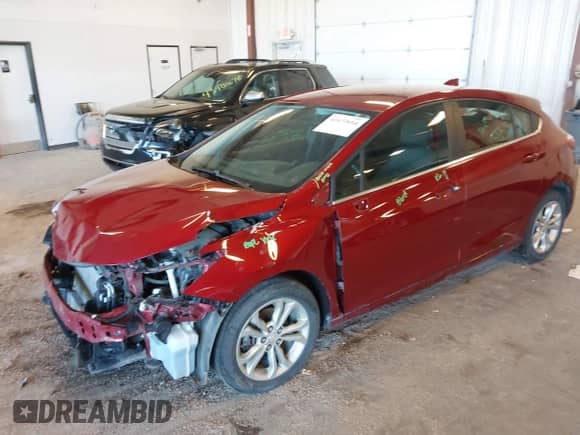 2019 Chevrolet Cruze LT with VIN 3G1BE6SM5KS602121, listed as a IAAI auction lot 43477604 with 81,288 mi miles and . Bid and sale history available at DreamBid. Image 2.