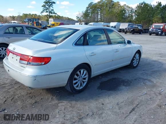 2006 Hyundai Azera SE with VIN KMHFC46F36A120653, listed as a IAAI auction lot 41729959 with 133,083 mi miles and . Bid and sale history available at DreamBid. Image 4.
