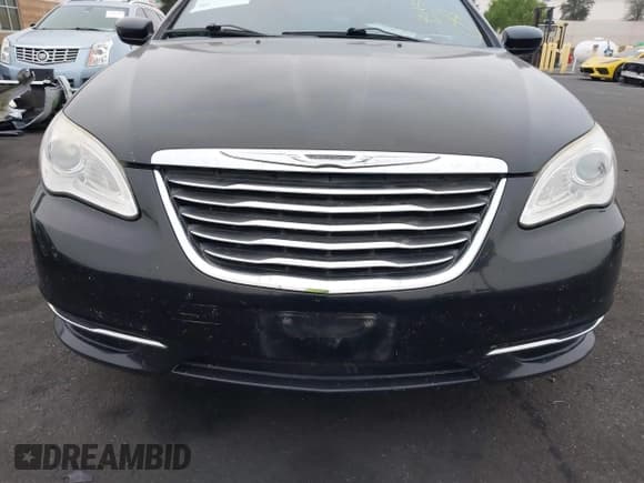 ✅ 2012 Chrysler 200 Touring • VIN: 1C3BCBEB7CN218910 • Lot: 42997354. Listed on IAAI with 151,562 mi. Free auction sales archive from the USA and detailed vehicle history report at DreamBid. Image 12.
