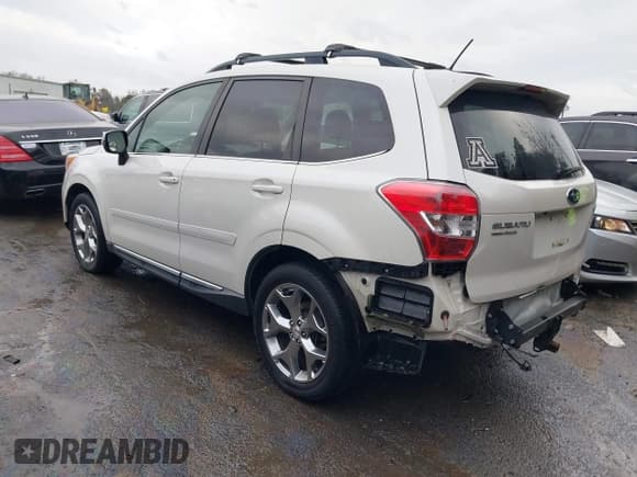 ✅ 2015 Subaru Forester Touring • VIN: JF2SJAWC9FH582396 • Лот: 43702787. Опубликован ранее на IAAI с пробегом 130 365 миль. Бесплатный доступ к архиву аукционных продаж из США и подробный отчёт об истории автомобиля на DreamBid. Изображение 3.