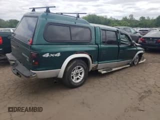 ✅ 2003 Dodge Dakota SLT • VIN: 1D7HG48N73S239498 • Lot: 57225245. Wystawiony na Copart z przebiegiem Nie podano. Bezpłatny archiwum sprzedaży aukcyjnych z USA i szczegółowy raport historii pojazdu na DreamBid. Zdjęcie 3.