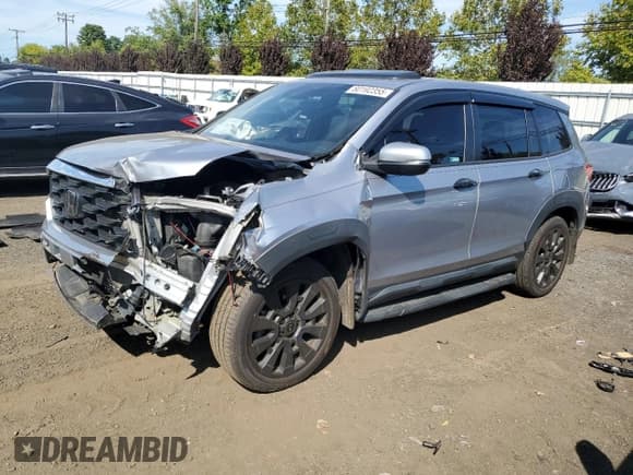 ✅ 2022 Honda Passport EX-L • VIN: 5FNYF8H50NB031970 • Lot: 80192355. Listed on Copart with 54,898 mi. Free auction sales archive from the USA and detailed vehicle history report at DreamBid. Image 1.