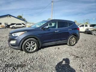 ✅ 2015 Hyundai Santa Fe • VIN: 5XYZUDLA7FG285886 • Лот: 90075335. Опубликован ранее на Copart с пробегом 211 802 миль. Бесплатный доступ к архиву аукционных продаж из США и подробный отчёт об истории автомобиля на DreamBid. Изображение 1.