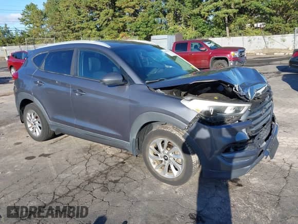 2016 Hyundai Tucson SE with VIN KM8J3CA48GU053428, listed as a IAAI auction lot 43407227 with 121,790 mi miles and . Bid and sale history available at DreamBid. Image 1.