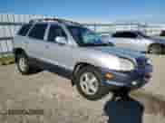 2002 Hyundai Santa Fe GLS z VIN KM8SC73D92U182330, wystawiony jako Copart lot #41827535 z przebiegiem 177 157 mil mil oraz Szkoda całkowita • Salvage title. Historia ofert i sprzedaży dostępna na DreamBid. Obrazek 4.