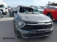 ✅ 2023 Kia Sportage X-Line • VIN: 5XYK6CAF1PG033864 • Lot: 43388537. Wystawiony na IAAI z przebiegiem 53 961 mil. Bezpłatny archiwum sprzedaży aukcyjnych z USA i szczegółowy raport historii pojazdu na DreamBid. Zdjęcie 12.