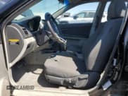 ✅ 2005 Kia Spectra • VIN: KNAFE161655072197 • Lot: 63872825. Listed on Copart with 216,260 mi. Free auction sales archive from the USA and detailed vehicle history report at DreamBid. Image 7.