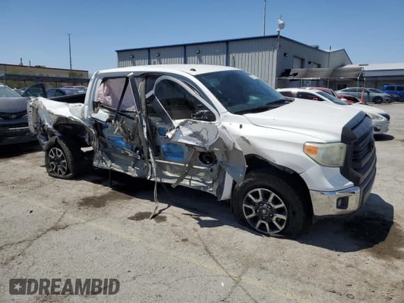 ✅ 2014 Toyota Tundra SR5 • VIN: 5TFDM5F12EX051744 • Lot: 57663905. Listed on Copart with 159,032 mi. Free auction sales archive from the USA and detailed vehicle history report at DreamBid. Image 4.