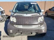 ✅ 2006 Smart fortwo • VIN: WME4503321J285051 • Лот: 88683835. Опубликован ранее на Copart с пробегом 94 663 миль. Бесплатный доступ к архиву аукционных продаж из США и подробный отчёт об истории автомобиля на DreamBid. Изображение 5.