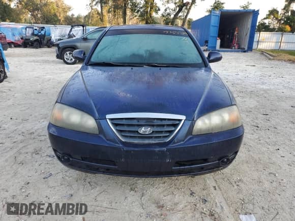 2005 Hyundai Elantra GLS z VIN KMHDN46D25U968715, wystawiony jako Copart lot #77871704 z przebiegiem 223 498 mil mil oraz Szkoda całkowita • Salvage title. Historia ofert i sprzedaży dostępna na DreamBid. Obrazek 5.