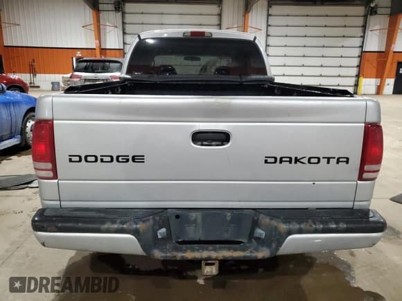 ✅ 2003 Dodge Dakota Sport • VIN: 1D7HL38N93S211272 • Lot: 86340074. Wystawiony na Copart z przebiegiem 356 331 mil. Bezpłatny archiwum sprzedaży aukcyjnych z USA i szczegółowy raport historii pojazdu na DreamBid. Zdjęcie 6.